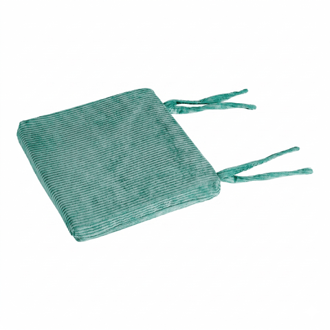 Ein tealfarbenes, quadratisches KraftKids Sitzkissen für Stühle aus Breitcord mit zwei Paar Stoffbändern auf einer Seite und einem abnehmbaren Bezug, abgebildet vor einem weißen Hintergrund.