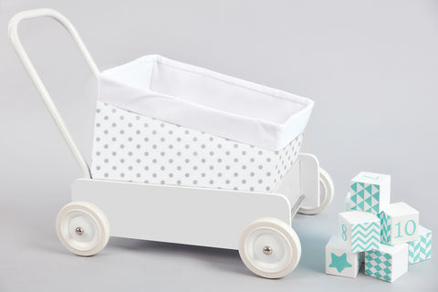 Almindelig hvid kurv med grå prikker på hvid