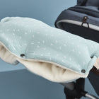 Der KraftKids Kinderwagenmuff Musselin mint Pusteblumen ist ein weiches, kuscheliges Accessoire aus hochwertiger Baumwolle, ideal um Ihr Baby im Kinderwagen warm und bequem zu halten.